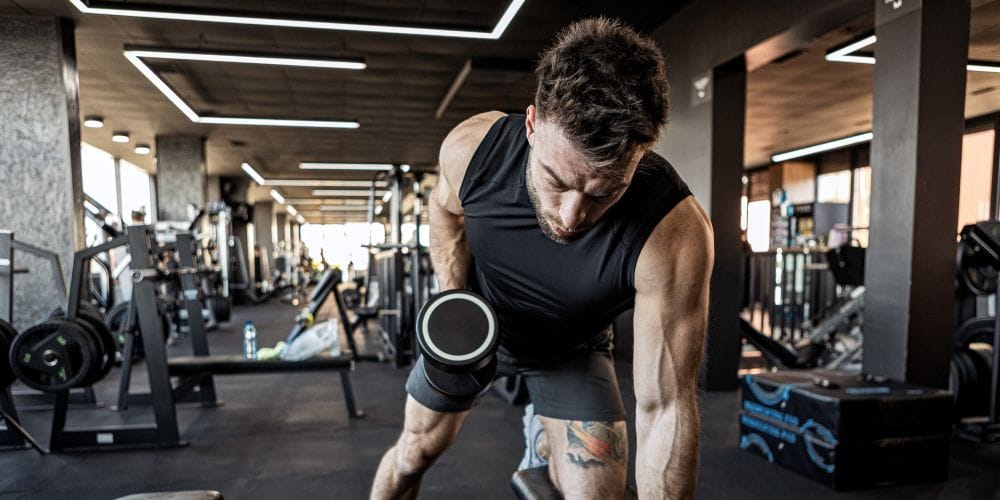 Man exercising in a gym.